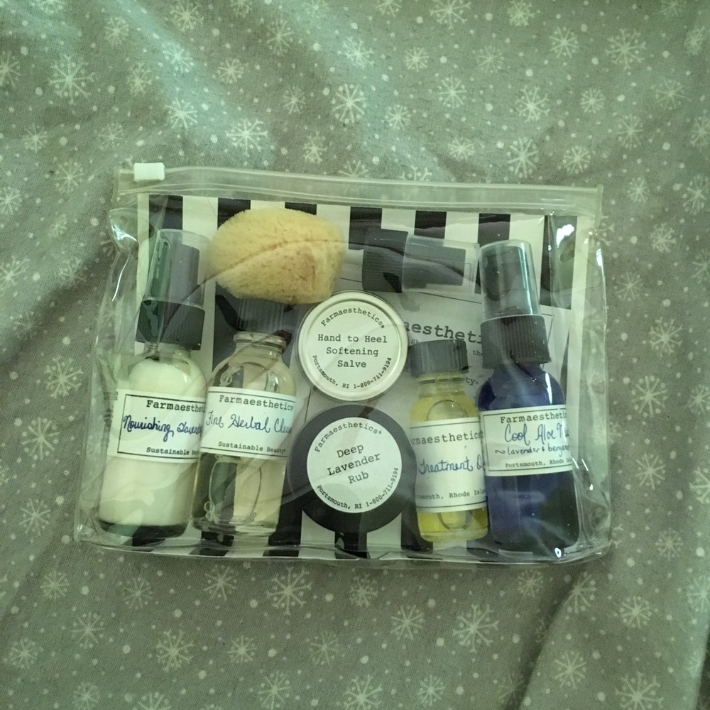 Travel bag of lotions, cleansers, salve, body mist